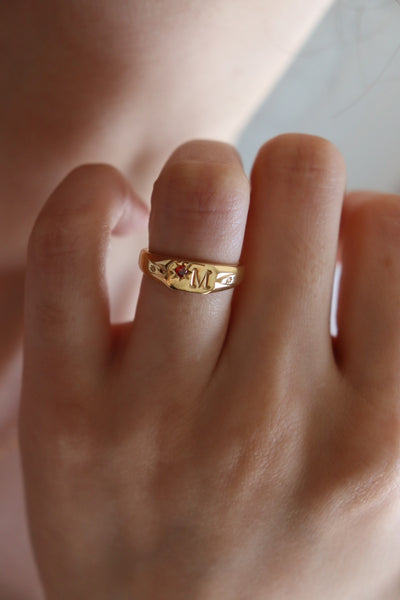 Signet initial ring with one birthstone