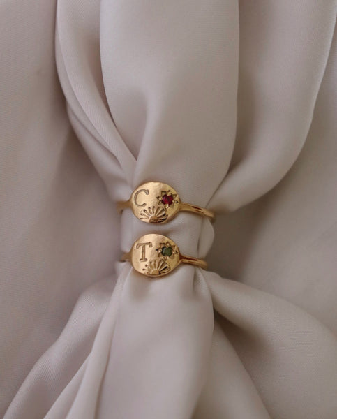 Sun and star initial ring with birthstone