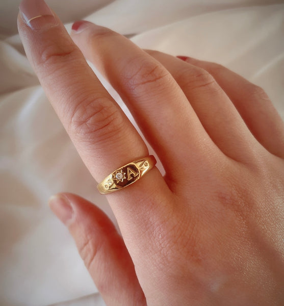 Signet initial ring with one birthstone