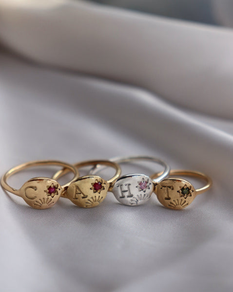 Sun and star initial ring with birthstone